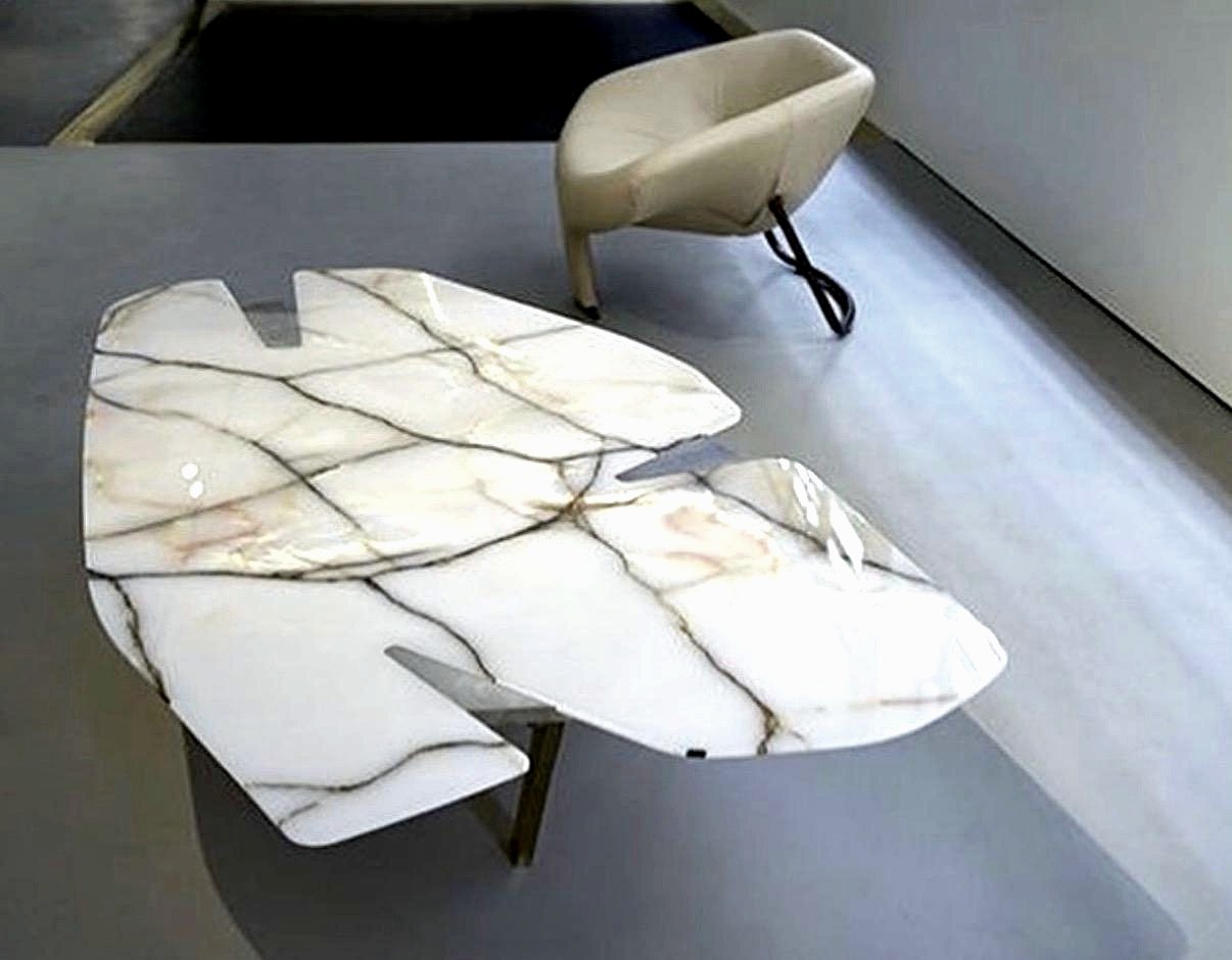 Sculptural onyx coffee table, bookmatched veining